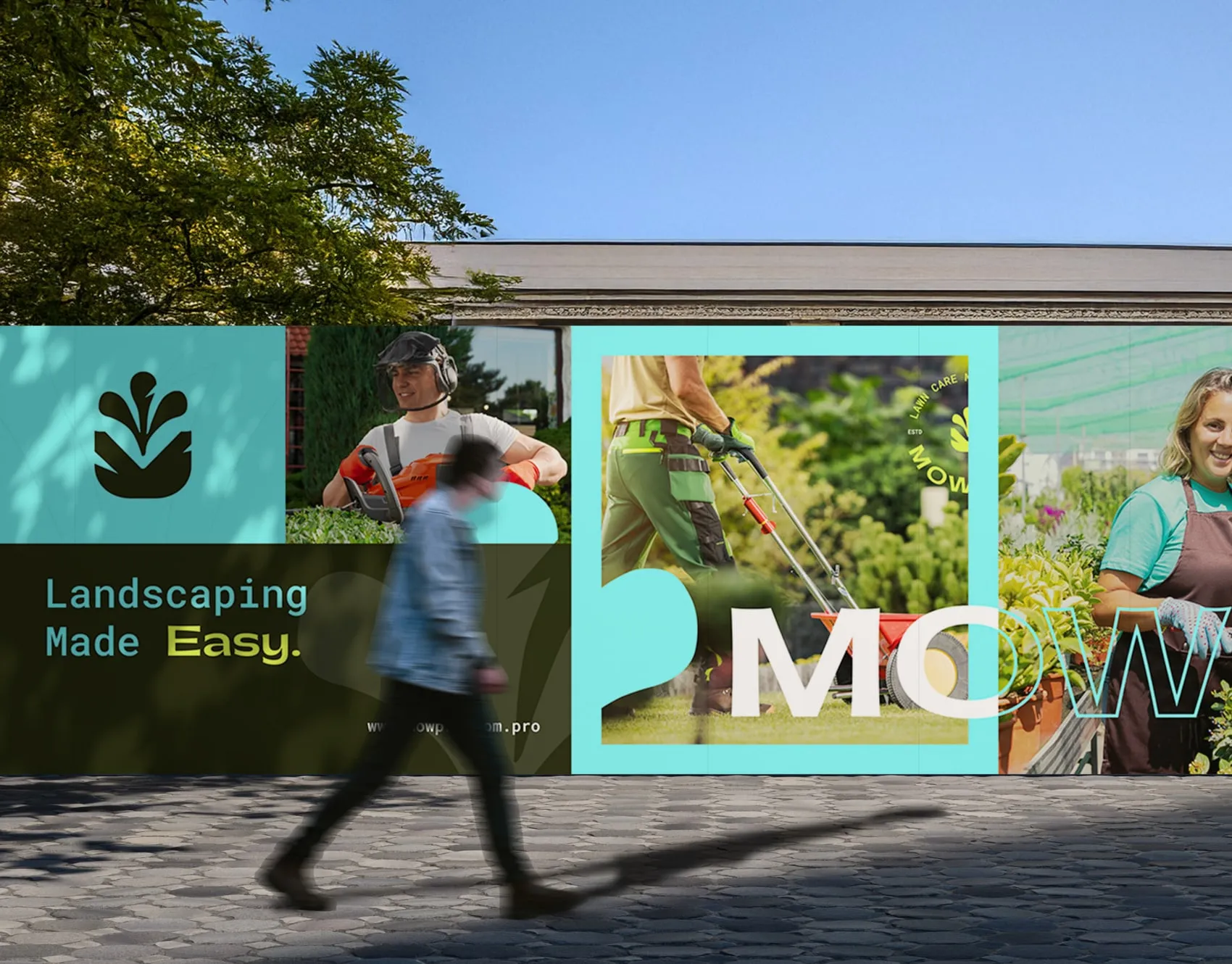 MowPro landscaping signage and photos of a gardener mowing on a garden centre wall