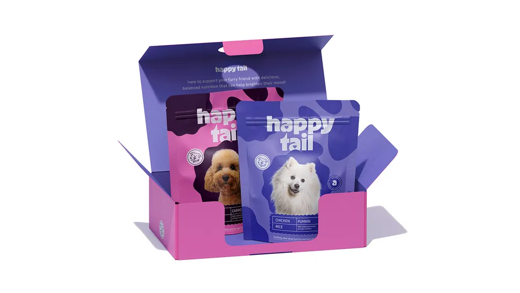 Happy Tail pink mailer box, open, holding a pink poodle pouch and a lilac pouch with a white fluffy dog