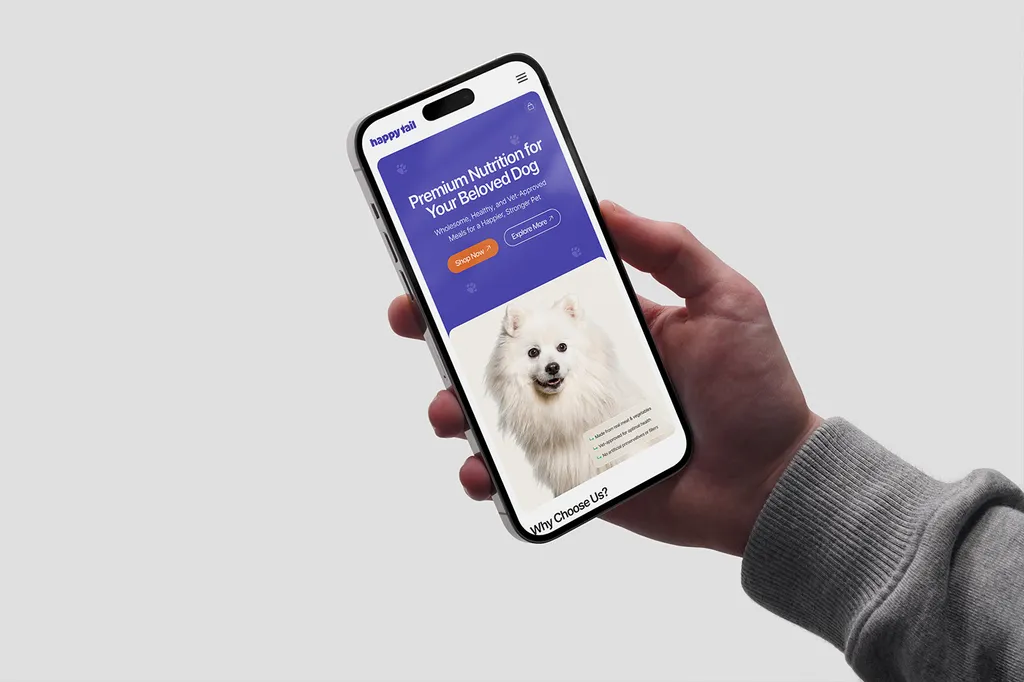 Happy Tail mobile site on a phone in a hand: “Premium Nutrition for Your Beloved Dog” above a white dog
