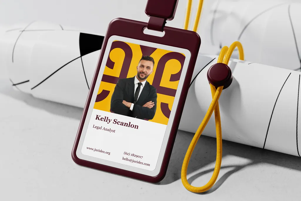 JurisLex ID badge for a legal analyst in a burgundy holder with a yellow lanyard