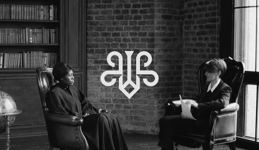 JurisLex mark in white over a black and white photo of two women talking in leather armchairs