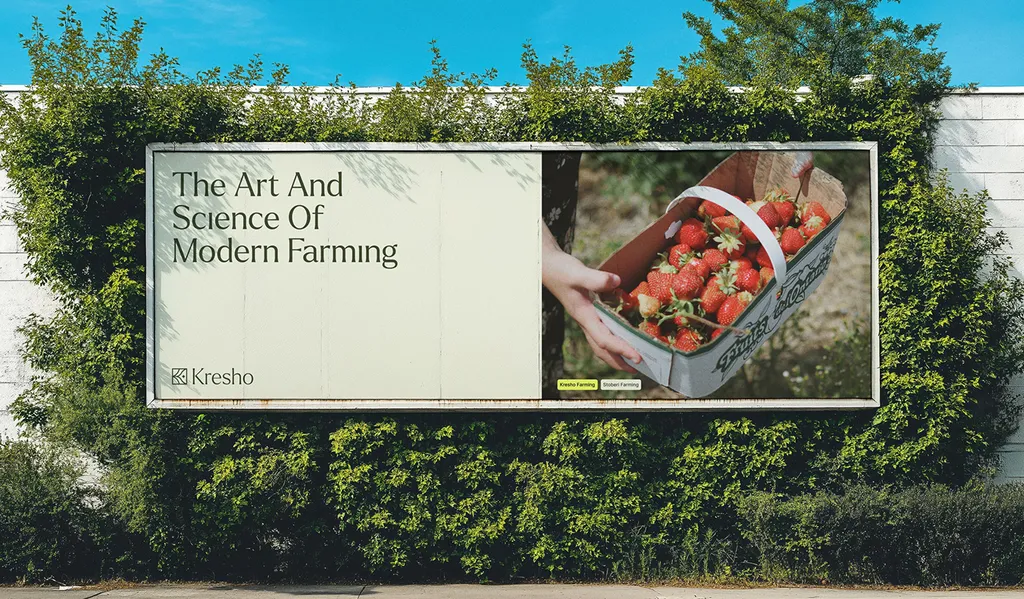 Kresho billboard on a hedge wall: “The art and science of modern farming”