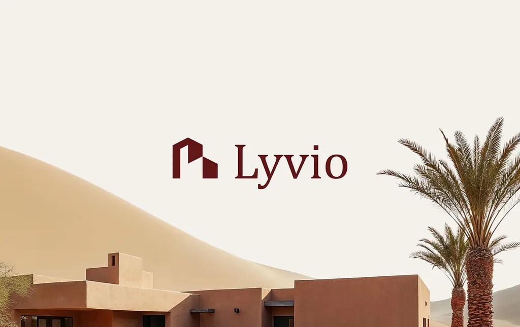 Lyvio logo over a desert scene with terracotta buildings and a palm tree