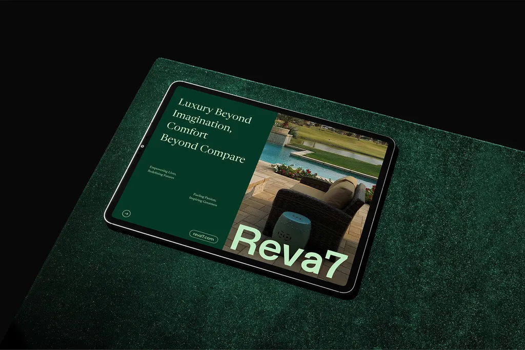 Tablet on green felt showing the Reva7 website: “Luxury beyond imagination”