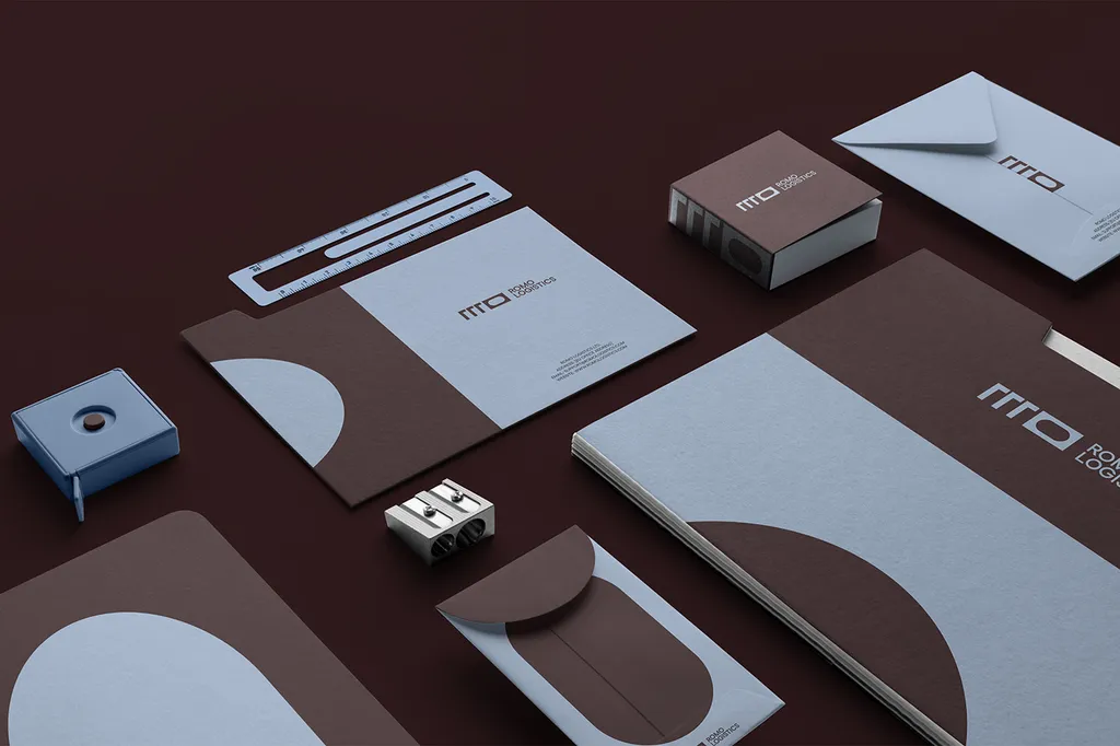 ROMO stationery: letterhead, envelopes, cards and a notebook in brown and blue