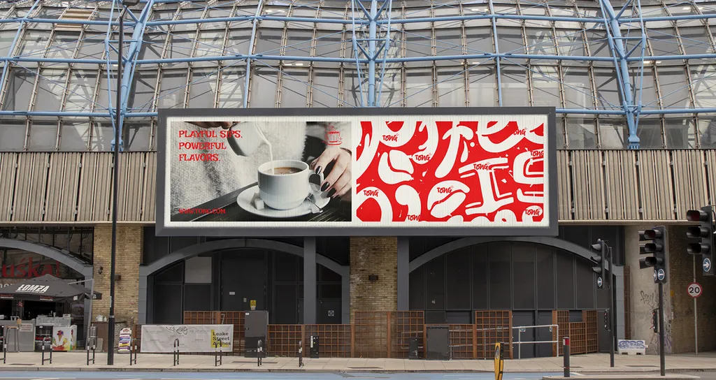 Tong billboard across the front of a train station