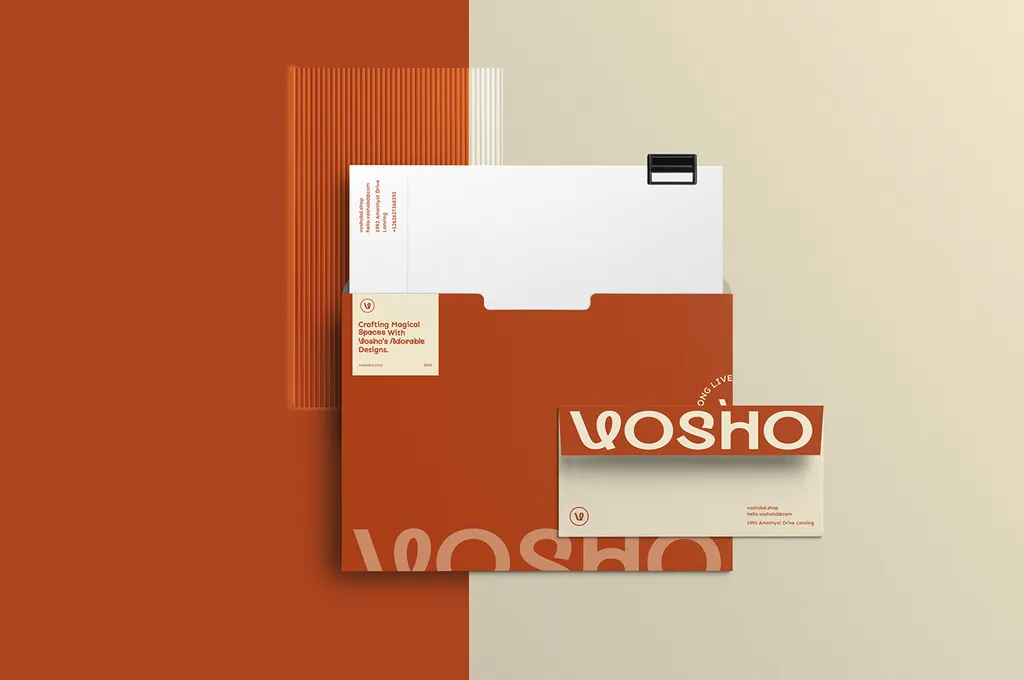 Vosho stationery on rust and cream: a folder, letter, envelope and a card reading “Crafting Magical Spaces With Vosho’s Adorable Designs.”