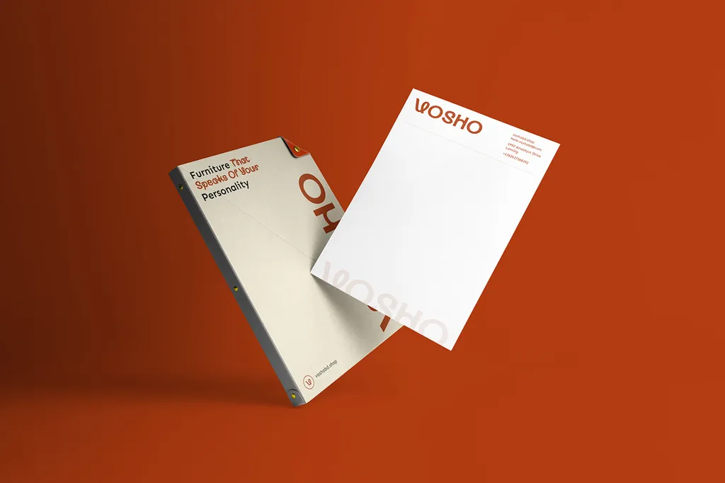 Vosho binder and letterhead floating on rust orange, the binder reading “Furniture That Speaks Of Your Personality”