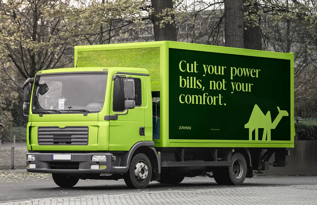 Lime green ZAYAN truck with a camel and the line “Cut your power bills, not your comfort”