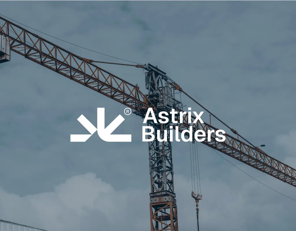 Astrix Builders logo in white over a construction crane against the sky