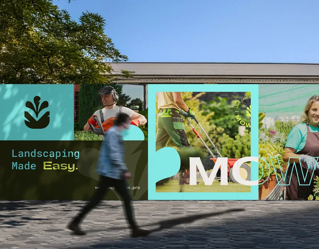 MowPro landscaping signage and photos of a gardener mowing on a garden centre wall